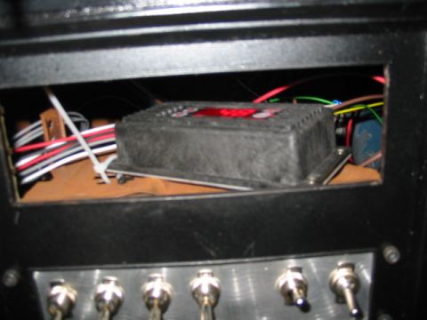 1985 Ford Crown Victoria LTD - Close-up of an aftermarket electronic module with visible wiring and a red digital display.