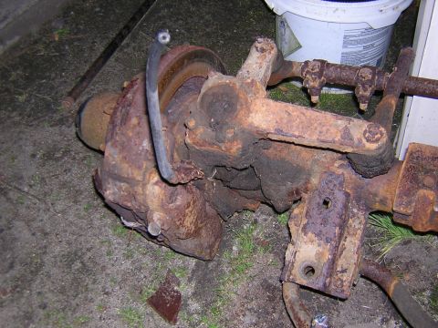 1979 Ford Bronco - This heavily corroded axle assembly, likely from an older vehicle, shows significant rust and wear.