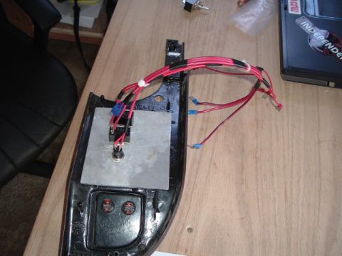 1989 Ford Bronco - Wiring and switch installed on a car interior trim piece.