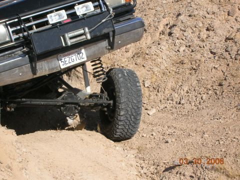 1985 Ford Bronco - perrys spring coming out of the bottom.