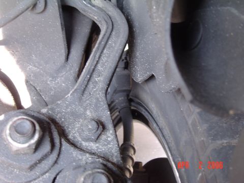 1998 Ford Crown Victoria - This the Backside of the whhel at full lock,its hitting on the Brake line bracket.I can probably just bend the bracket a bit or relocate th…