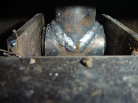1992 Ford Bronco - Detail of a welded metal component, likely part of a vehicle's undercarriage or frame.