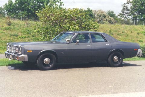 1978 Dodge Monaco - This 1977 Dodge Monaco sedan is parked outdoors on a paved surface.