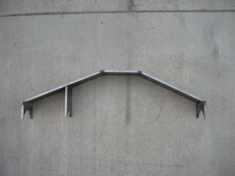 1997 Ford Ranger - A custom metal fabrication part is shown mounted against a concrete wall, with a Supermotors.net watermark at the bottom right.