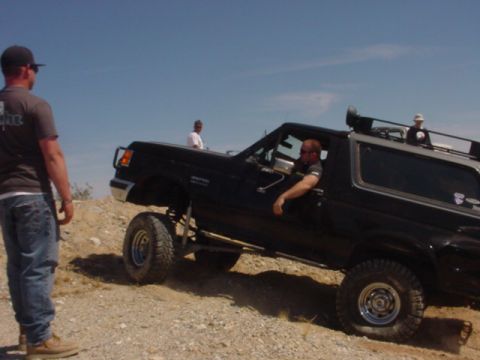 1988 Ford Bronco - Off-roading in a 1988 Ford Bronco on a sunny day.