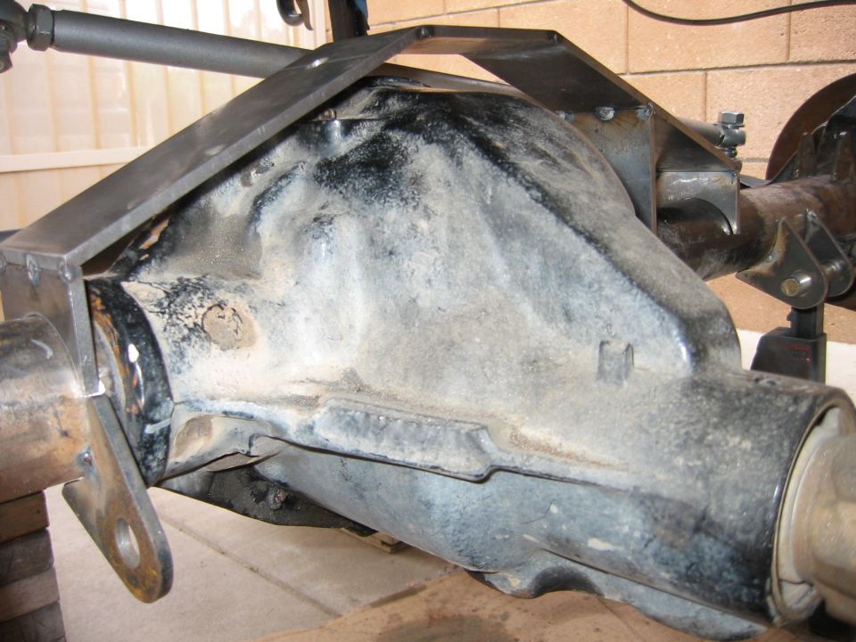 rear differential housing with a metal bracket welded on top