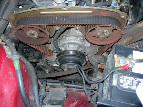 1992 Ford Taurus - Engine timing belt and pulleys are visible in this close-up view.