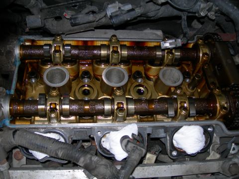 1992 Ford Taurus - Close-up view of an engine's internal components, showing the camshafts and valve train assembly.