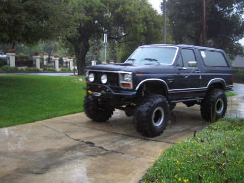 1985 Ford Bronco - This modified Ford Bronco sits high on its suspension, ready for off-road adventures.