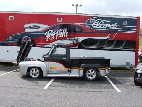 1966 Ford Ranchero - Custom 1956 Ford pickup truck with open hood, parked before a trailer a Roy Hill's Drag Racing School graphic.