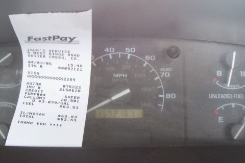 1994 Ford F-150 - A receipt is placed over the dashboard of a vehicle, obscuring most of the interior details.