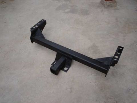 1989 Ford Bronco - Trailer hitch receiver part shown on a concrete surface.