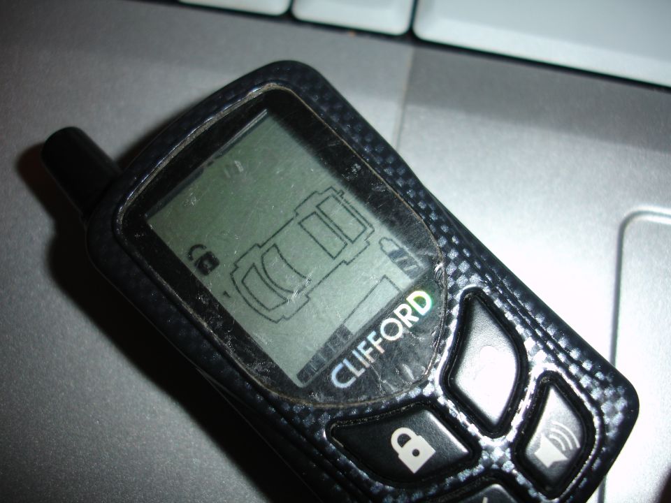 Clifford remote car starter fob with a car icon displayed on its screen