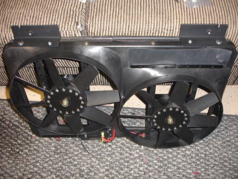 1996 Ford Bronco - A pair of black electric cooling fans are shown mounted on a bracket.