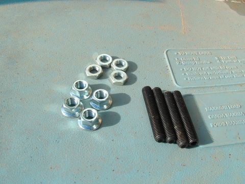 1990 Ford Bronco - Hardware kit includes hex nuts and threaded bolts, with instructional text visible.