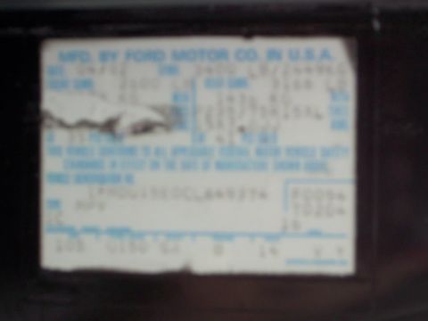 1982 Ford Bronco - A close-up of a Ford VIN sticker, showing manufacturing information and vehicle identification numbers.
