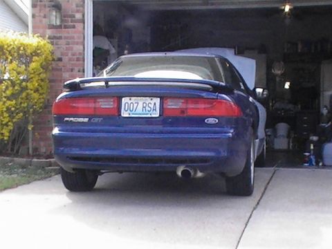 1994 Ford Probe - Rear view of a blue 1994 Ford Probe GT with a spoiler and custom license plate.
