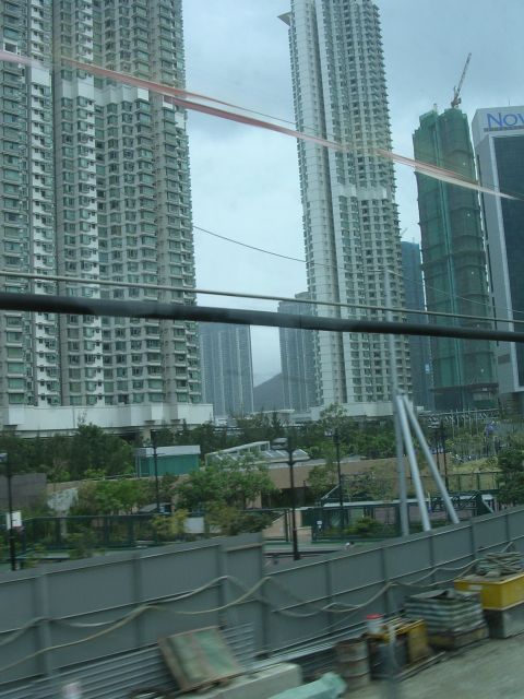 1999 Toyota Tacoma - A cityscape numerous high-rise buildings and ongoing construction projects.