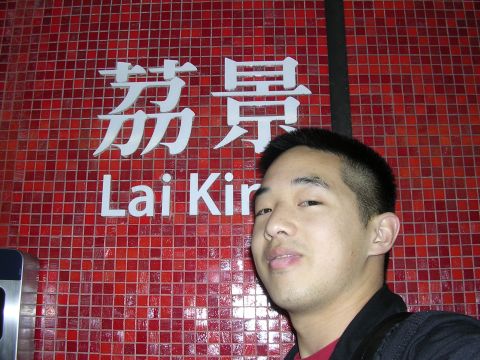 1999 Toyota Tacoma - A man poses in front of a red tiled wall displaying Chinese characters and the text "Lai Ki".