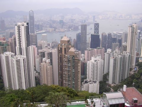 1999 Toyota Tacoma - A panoramic view of the Hong Kong skyline, numerous high-rise buildings and Victoria Harbour.