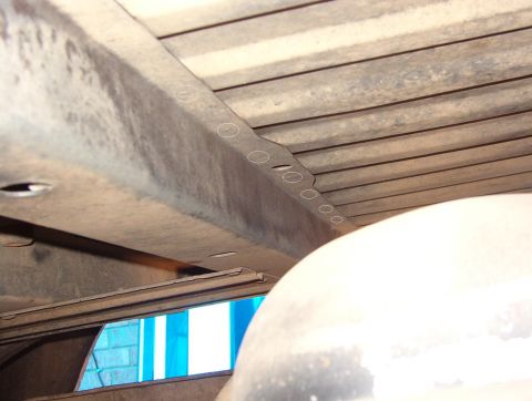 1983 Ford Bronco - This shows the welds' locations in relation to the lip of the channel. Cut behind this lip; the front edge of the hole can be an inch or so…