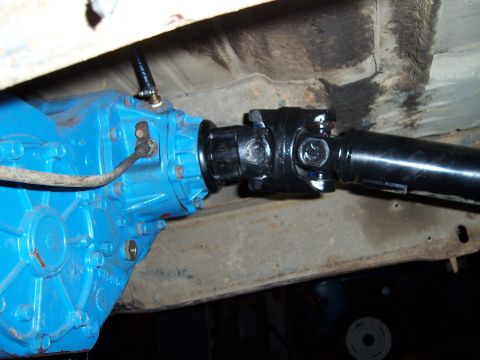 1983 Ford Bronco - Transfer case and driveshaft assembly, likely from a 4x4 vehicle.