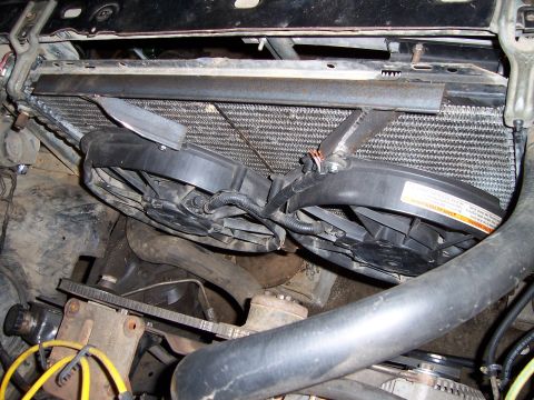 1983 Ford Bronco - Two electric cooling fans are installed in front of the vehicle's radiator.