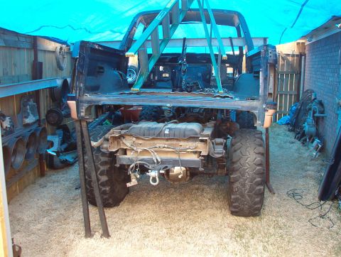 1994 Ford Bronco - The thing in back is because I couldn't get it to balance, but it's at the perfect height to roll the chassis out.