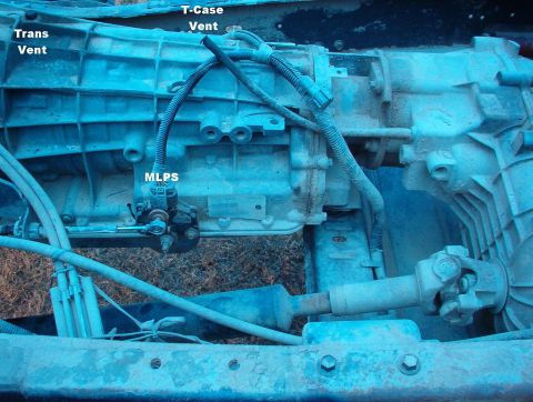 1994 Ford Bronco - The image shows the transmission and transfer case components of a vehicle, with various parts labeled.