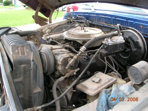 1985 Ford Bronco - Engine bay details including radiator, AC compressor, and brake master cylinder. Date stamp is visible.