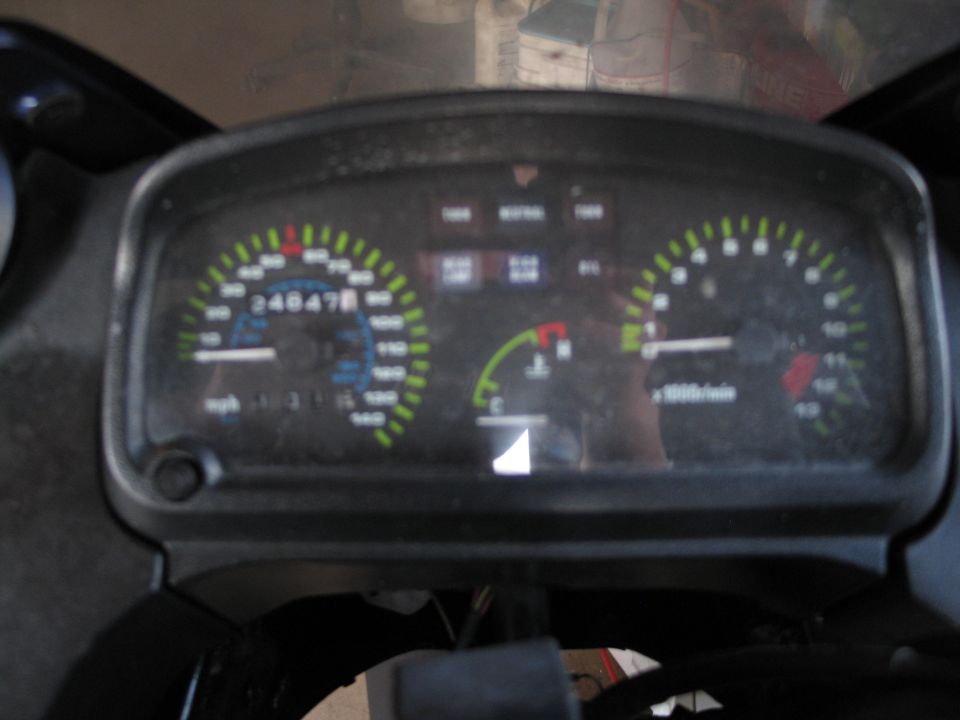 Motorcycle gauge cluster with speedometer, temp gauge and tachometer