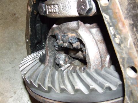 1986 Ford Bronco - Damaged differential gears inside a vehicle's axle housing.