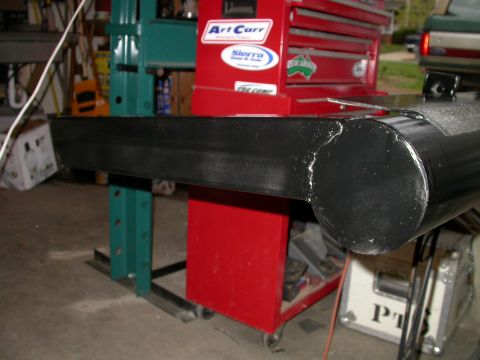 1990 Ford Bronco - A close-up view of a black rear tube bumper, likely an aftermarket accessory.