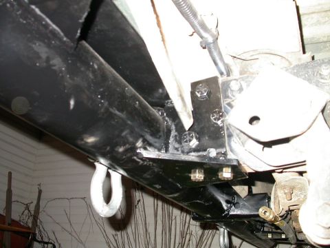 1990 Ford Bronco - Bolted to frame via three stock mounting holes plus two more in bottom of frame rails, with grade 8 bolts.
