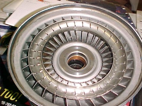 1997 Ford Taurus - A close-up view of a vehicle's torque converter, showing its internal fin structure.