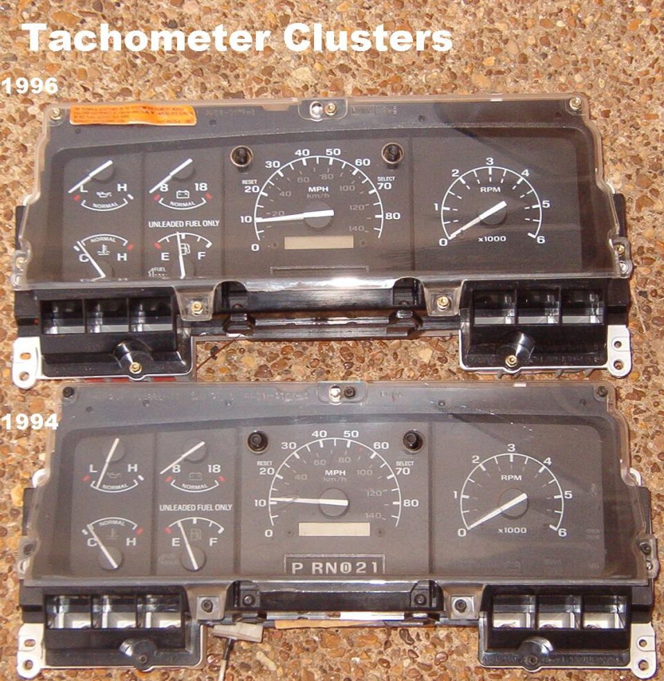 Two Ford truck tachometer instrument clusters, 1996 and 1994, shown side by side on gravel