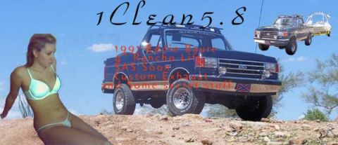 1991 Ford Bronco - A Ford F-Series truck towing a boat under a clear blue sky.