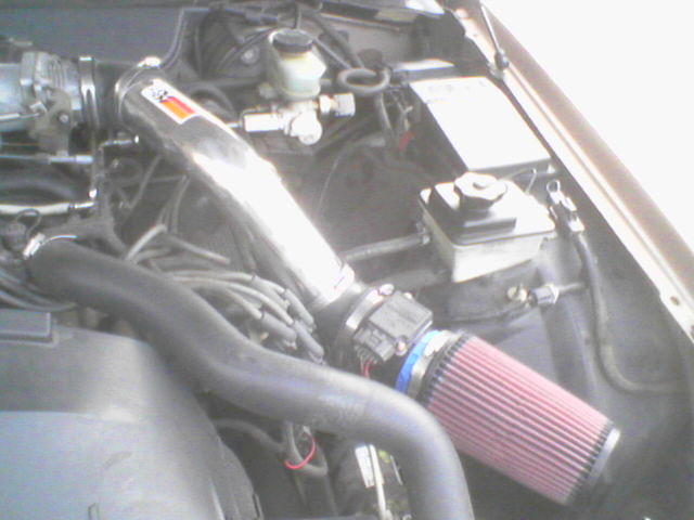 Engine bay with K&N air intake and red filter