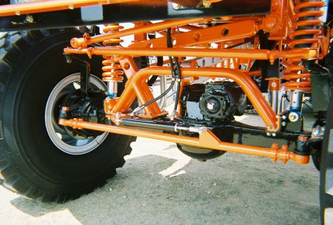 1989 Ford F-350 - Custom suspension and drivetrain parts on a heavily modified off-road vehicle.