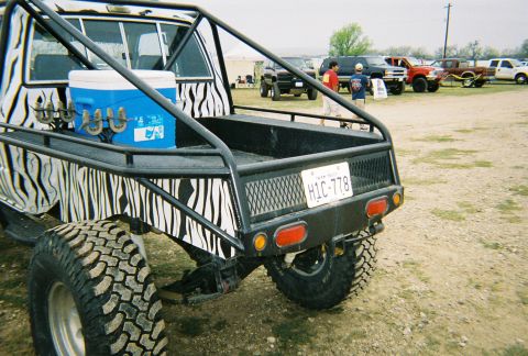 1989 Ford F-350 - This modified 1989 Ford F-350 pickup features a custom roll cage and zebra print body panels.