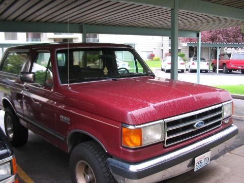 1991 Ford Bronco - This 1991 Ford Bronco is parked under a carport. The license plate reads 655-PBK.