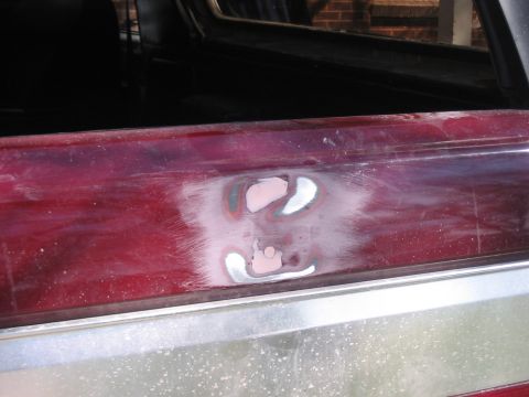 1991 Ford Bronco - Bodywork is underway on this vehicle, with primer and filler visible on a damaged section.