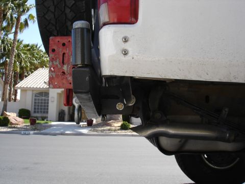 1996 Ford Bronco - Rear view of a 1996 Ford Bronco, showing the bumper, spare tire mount, and exhaust system.