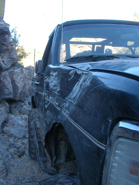 1984 Ford Bronco - The vehicle sustained significant damage to its bodywork while navigating a rough, rocky terrain.
