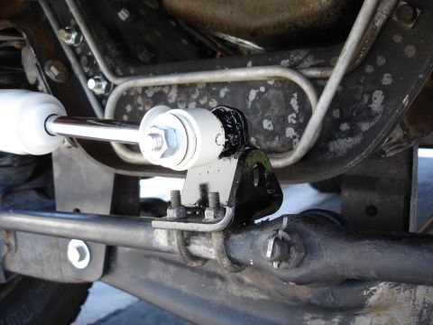 1996 Ford Bronco - Close up of the tie rod side. I welded a piece of plate on to the original bracket to convert from a stud to loop attachment.
