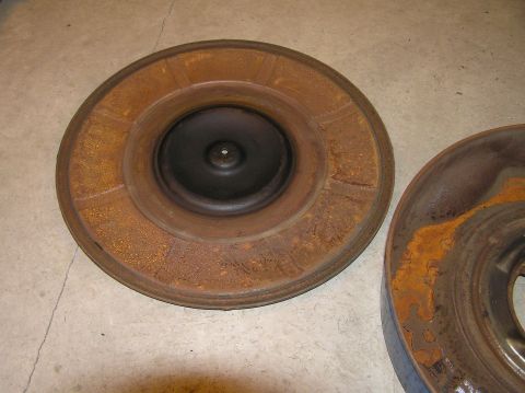 1967 Ford Galaxie - A rusty air cleaner lid is shown, with another part of an air cleaner visible to the right.