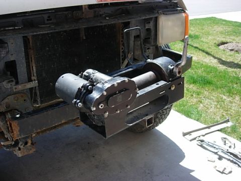 1987 Ford Bronco - OMG that thing is heavy! and it is going to get heavier. I am dissapointed in the factory winch cradle, especially how much I have to cut o…