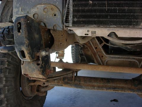 1987 Ford Bronco - more after. The a/c condensor needs to be supported. easy fix with a few sheet metal screws.