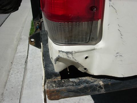 1987 Ford Bronco - this little peice of metal is not long for this world, it gets bent into my tailight and makes it hard to replace broken tailights. of cour…