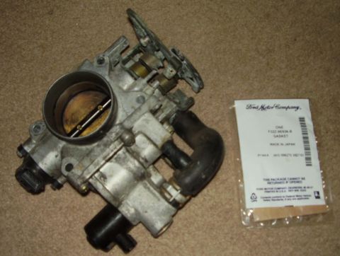 1993 Ford Probe - KLDE Throttle Body and New OEM Gasket , front view